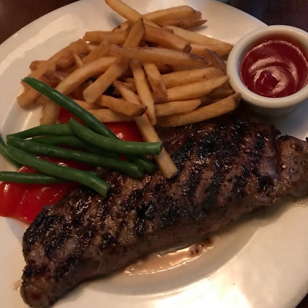 Photo taken at The Keg Steakhouse + Bar - Dunsmuir by Stephen B. on 6/30/2018