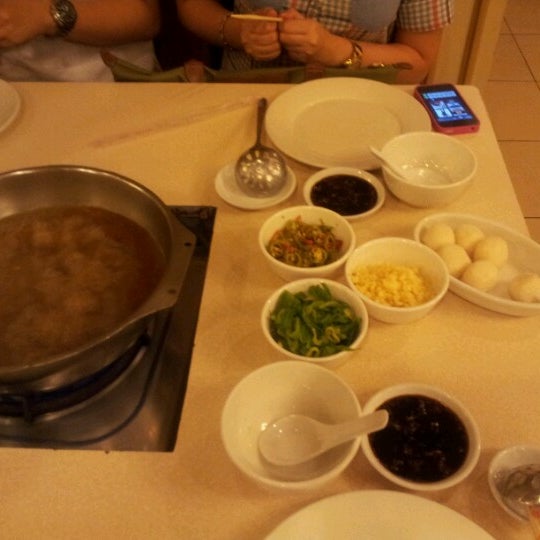 Photo taken at Tien Tien Hotpot Restaurant by Abi G. on 3/18/2013