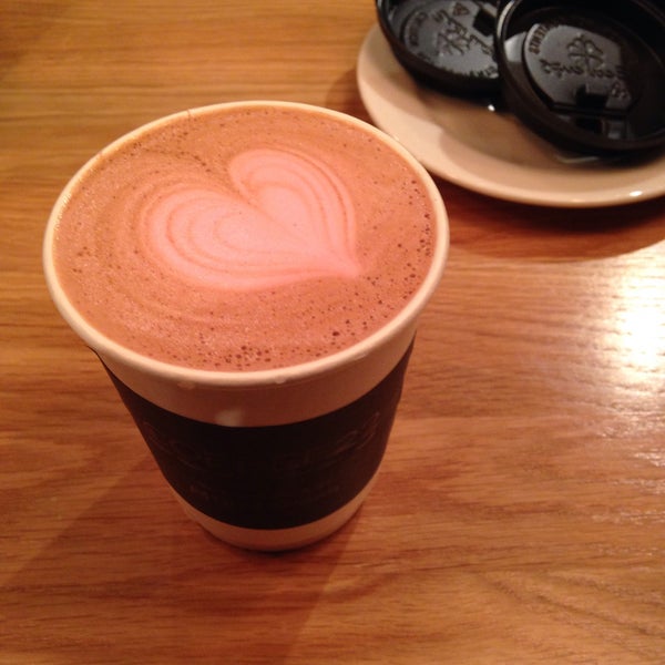 Photo taken at Coffee 22 by Kate T. on 3/1/2015