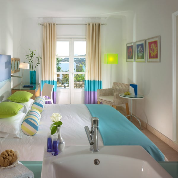 Our Designed suite offers luxurious, colourful accommodation with a touch of artistic flare! #PetasosBeach #Mykonos #PlatisGialos #Petasos #Beach #Summer2017 #Summer #SummerHolidays #SummerVacation