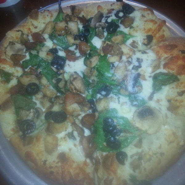 Photo taken at Top It Pizza by Alison S. on 5/3/2013
