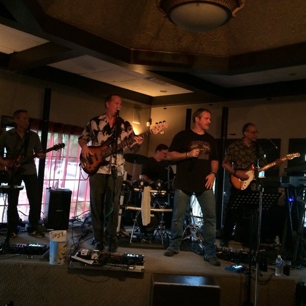 Photo taken at Capone&#39;s Bar &amp; Oven by Shannon M. on 5/28/2014