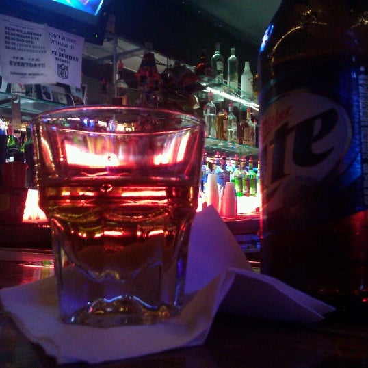 Photo taken at Mulligan&#39;s Shot Bar by Sam E. on 12/3/2012