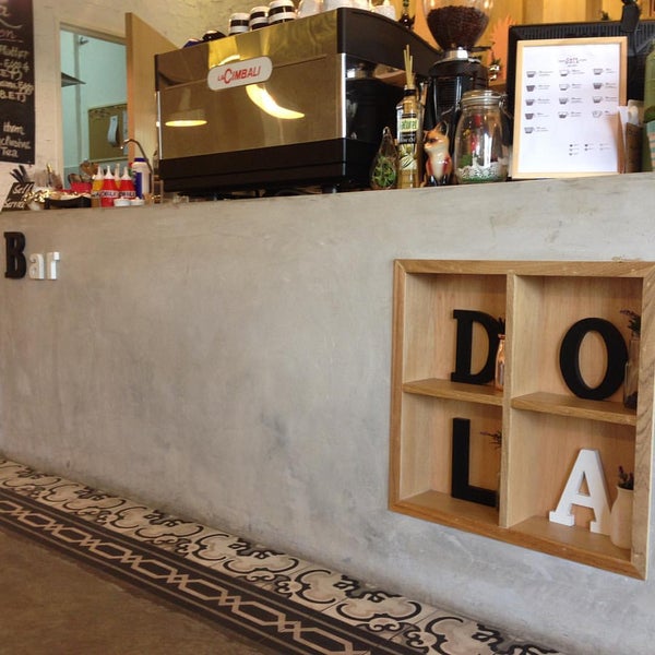 Photo taken at Cafe Dola by Andy C. on 9/20/2015
