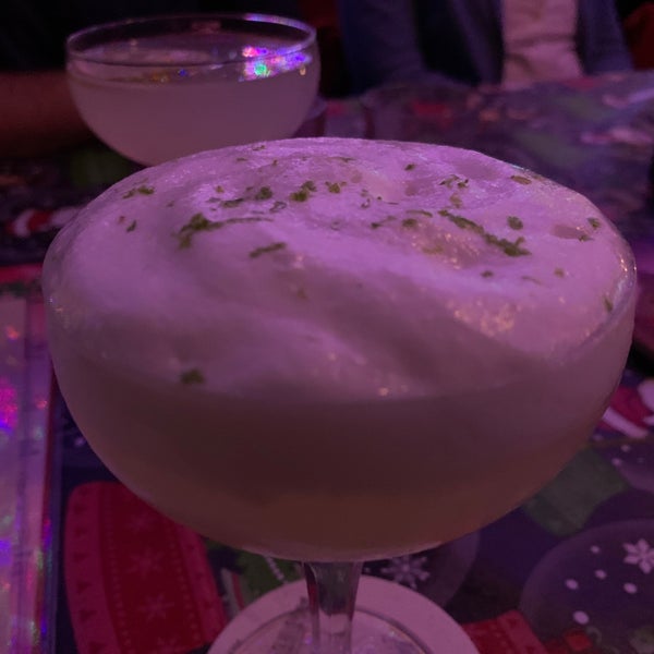 Photo taken at Bitter &amp; Twisted Cocktail Parlour by Chris L. on 12/15/2019