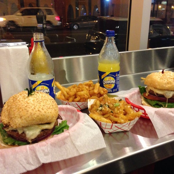 Photo taken at Pearl&#39;s Deluxe Burgers by Jonathan P. on 1/6/2014