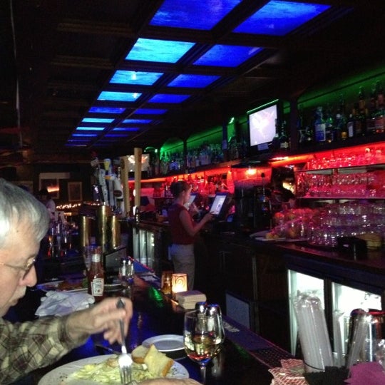 Photo taken at Sarah Street Grill by Eric G. on 12/31/2012