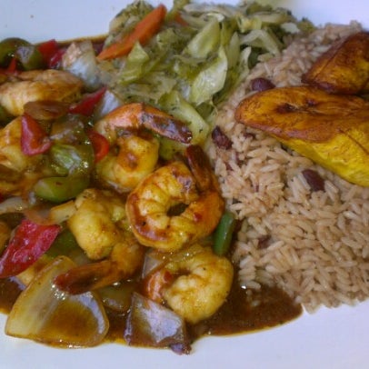 Foto tomada en Mangos Caribbean Restaurant  por Brad H. el 11/20/2012