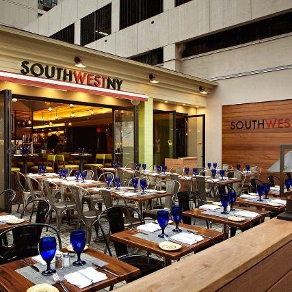 SouthWest NY features an earth-toned color palette, a large open bar where patrons can enjoy margaritas & cocktails & a fresh menu with items such as cedar-plank salmon, Mahi Mahi & NY Strip Steak