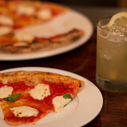 They have a few secret weapons, like two pizza ovens (a Neapolitan one and an electric-deck number for Sicilian and “classic Italian” styles), cocktails by former Bourbon & Branch bartender