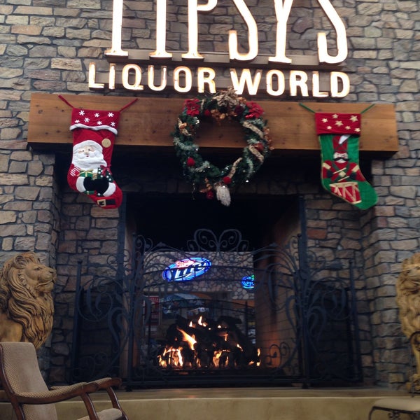 Photo taken at Tipsy&#39;s Liquor World by Sarah S. on 12/23/2014