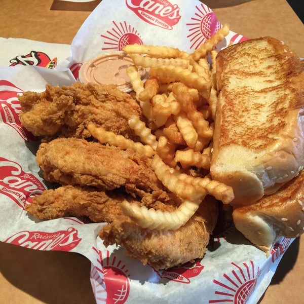 Photo taken at Raising Cane&#39;s Chicken Fingers by Joseph R. on 12/26/2014