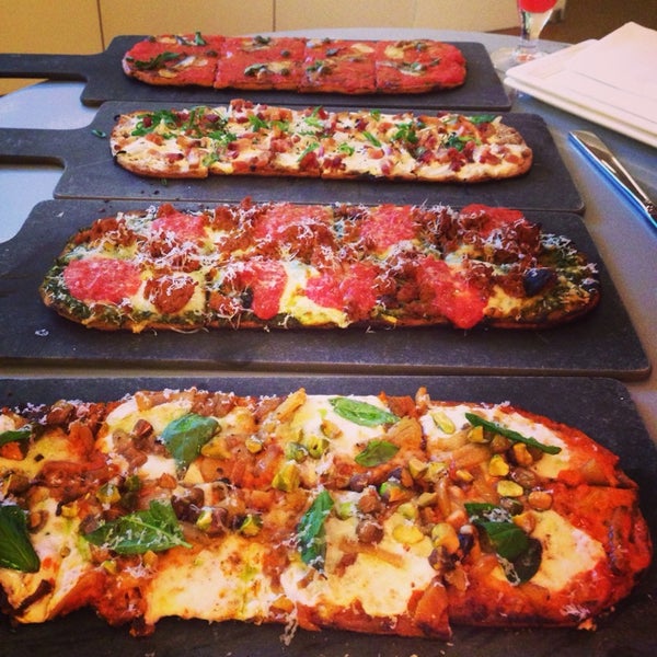 Photo taken at Pizza Vinoteca by Sarah D. on 4/4/2014