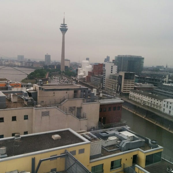 Photo taken at INNSIDE Düsseldorf Hafen by Tunsi R. on 5/2/2014