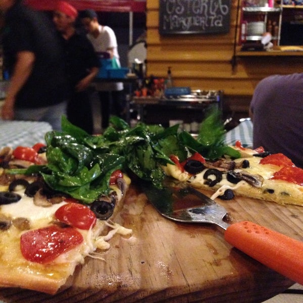 Photo taken at Osteria Marguerita. Pizza a La Leña by marco aurelio m. on 4/5/2014