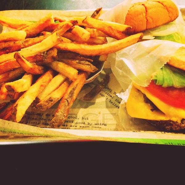 Photo taken at BurgerFi by Ahmad T. on 4/1/2014