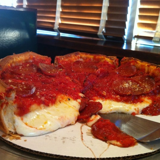 Photo taken at Giordano&#39;s by Carrie M. on 12/12/2012