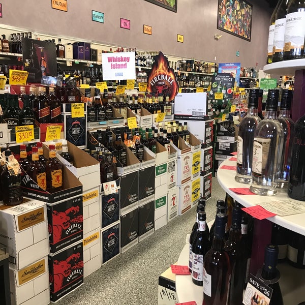 Photo taken at Wild Horse Wine &amp; Spirits by Marie F. on 8/17/2017