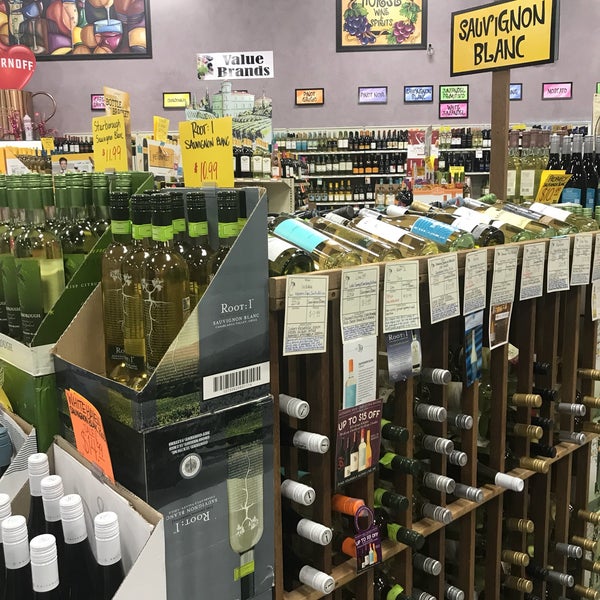 Photo taken at Wild Horse Wine &amp; Spirits by Marie F. on 2/7/2018