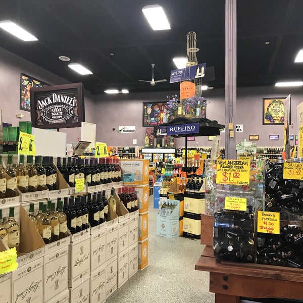 Photo taken at Wild Horse Wine &amp; Spirits by Marie F. on 4/4/2018