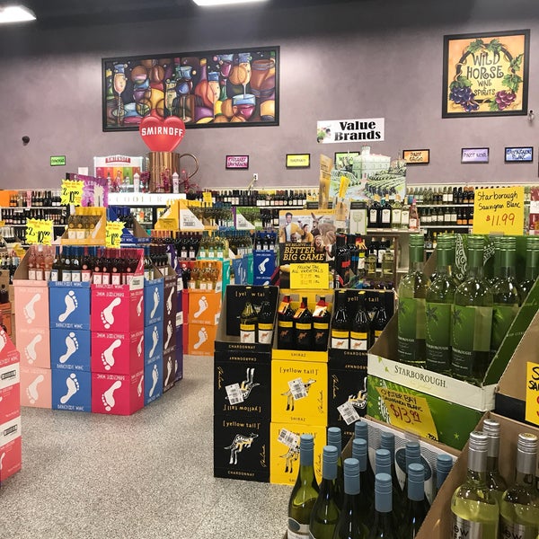 Photo taken at Wild Horse Wine &amp; Spirits by Marie F. on 2/13/2018