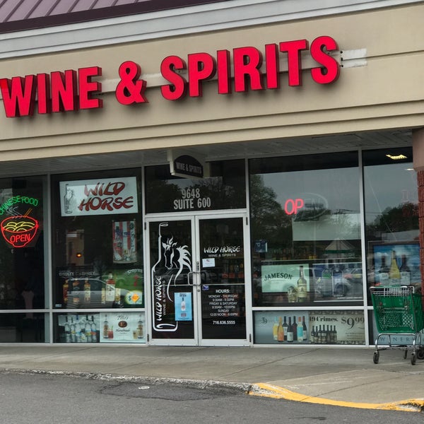 Photo taken at Wild Horse Wine &amp; Spirits by Marie F. on 5/21/2018