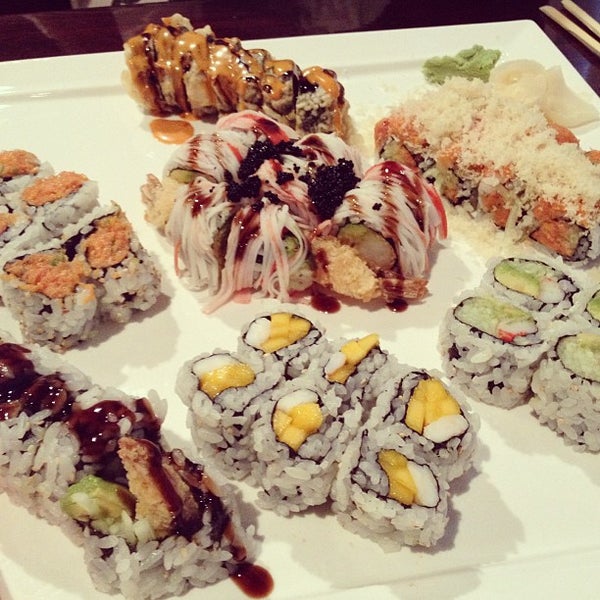 Photo taken at Sushi Kingdom by Amy M. on 5/11/2013