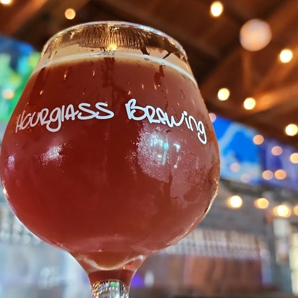 Photo taken at Hourglass Brewing at Hourglass District by Cody A. on 9/12/2022