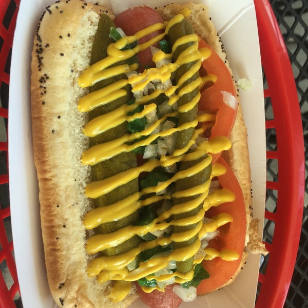Photo taken at Greatest American Hot Dogs by Roberto B. on 7/31/2016