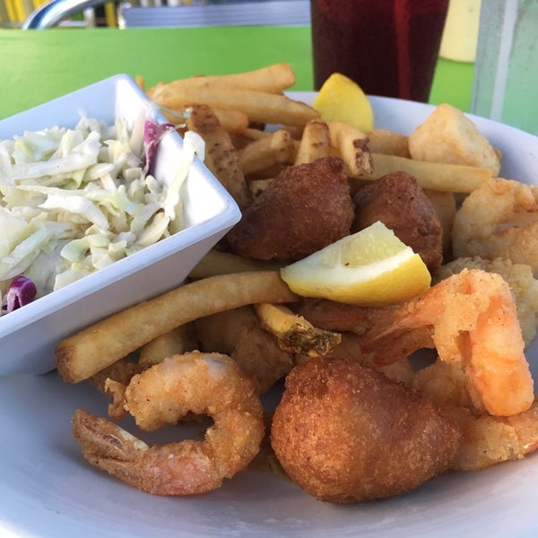 Fried shrimp, homemade hush puppies and the crisp, sweet slaw is the ultimate southern treat at this hidden gem. The view on the rooftop deck is the cherry on the top!