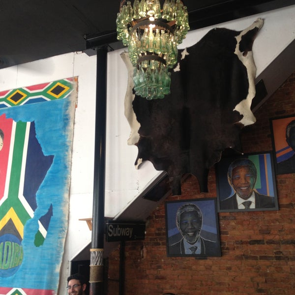 Photo taken at Madiba Restaurant by Lena G. on 6/1/2013