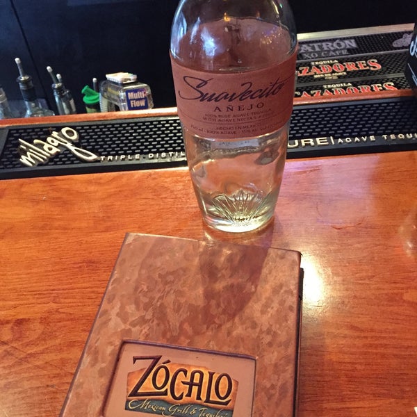 Photo taken at Zócalo Mexican Grill &amp; Tequilería by Christine S. on 6/15/2015