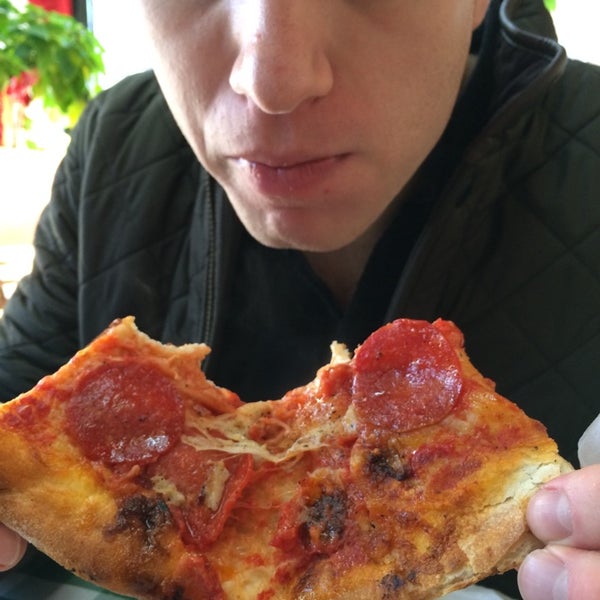 Photo taken at John &amp; Joe&#39;s Pizzeria by Emily L. on 11/2/2014
