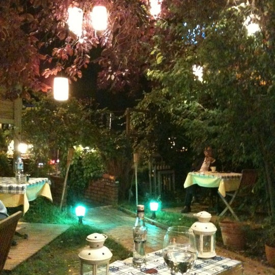 Photo taken at Tenes Bozcaada Balık Restoranı by Emre A. on 10/3/2012