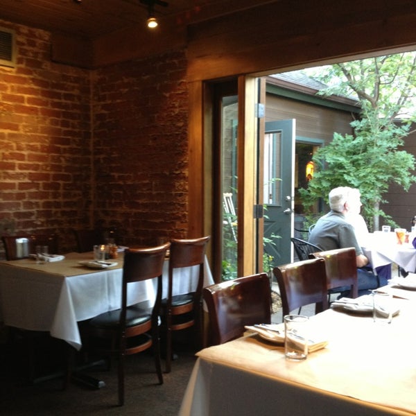 Photo taken at Brix Restaurant and Wine Bar by Grace K. on 6/16/2013