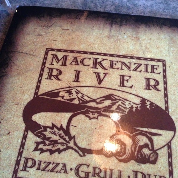 Photo taken at Mackenzie River Pizza, Grill, and Pub by Lightscap3s.com on 3/14/2014