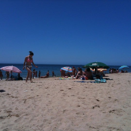 Photo taken at Praia dos Gémeos by olga m. on 7/21/2012