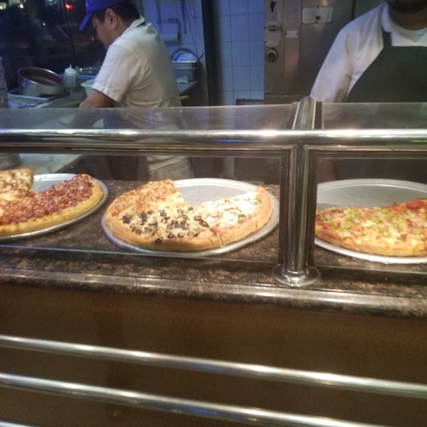 Photo taken at Cassiano&#39;s Pizza by Robert T. on 6/20/2018