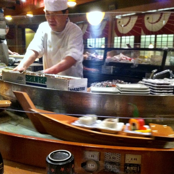 Photo taken at Sushi Boat by Rick D. on 3/7/2013