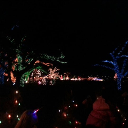 Photo taken at Austin Trail of Lights by Deb D. on 12/24/2012