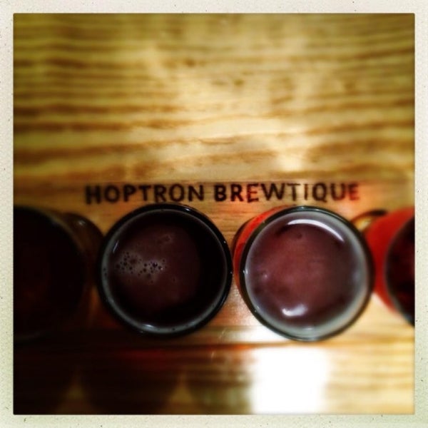 Photo taken at Hoptron Brewtique by Anthony P. on 5/12/2013
