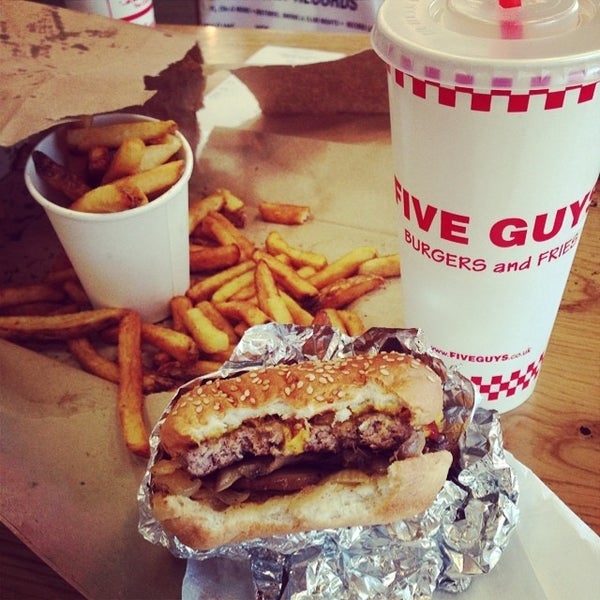 Photo taken at Five Guys by Laura M. on 6/25/2014