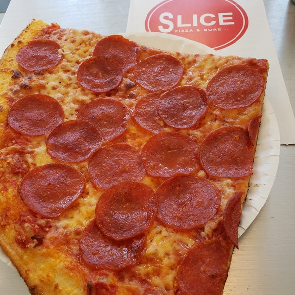 Снимок сделан в Slice Pizza &amp; More пользователем Chad R. 7/21/2018