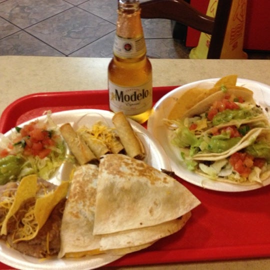 Photo taken at Taco Shop Mexican Grill by Vanessa L. on 12/20/2012