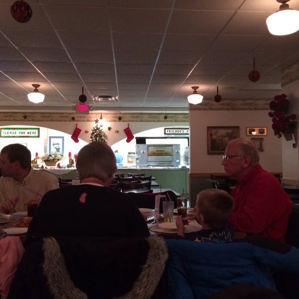 Photo taken at Fricano&#39;s Pizza Restaurant by Thomas J. on 12/22/2013