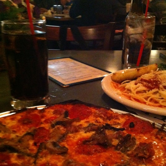 Photo taken at Fricano&#39;s Pizza Restaurant by Thomas J. on 10/27/2012