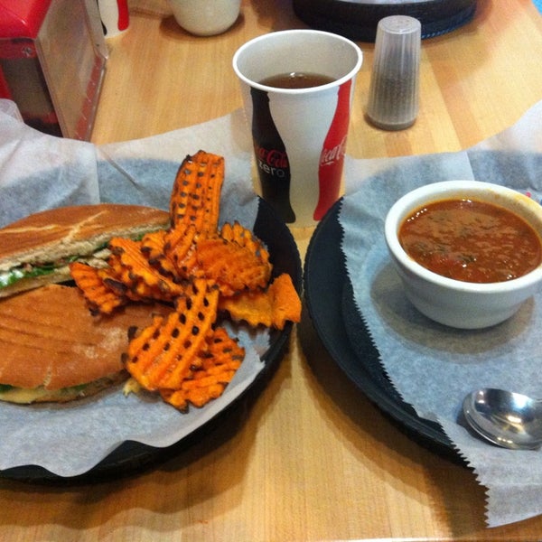 Photo taken at Hot Krust Panini Kitchen by Andrew T. on 12/30/2013