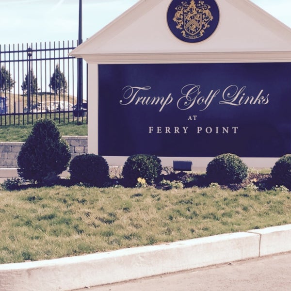 Photo taken at Trump Golf Links at Ferry Point by Mathew R. on 4/16/2015