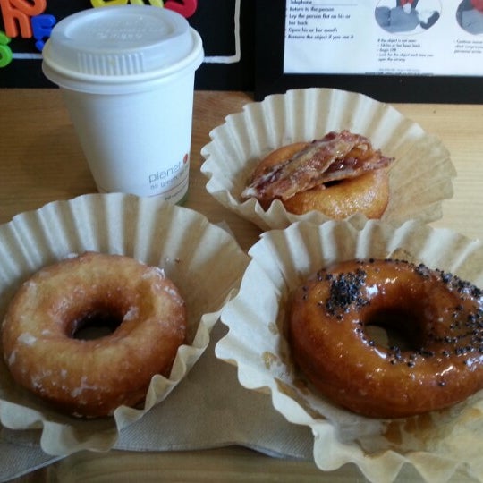 Photo taken at Boxer Donut &amp; Espresso Bar by Lou P. on 12/7/2012