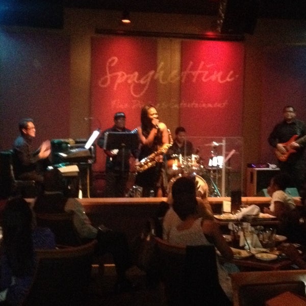 Photo taken at Spaghettini Fine Dining &amp; Entertainment by Debbie H. on 8/30/2014